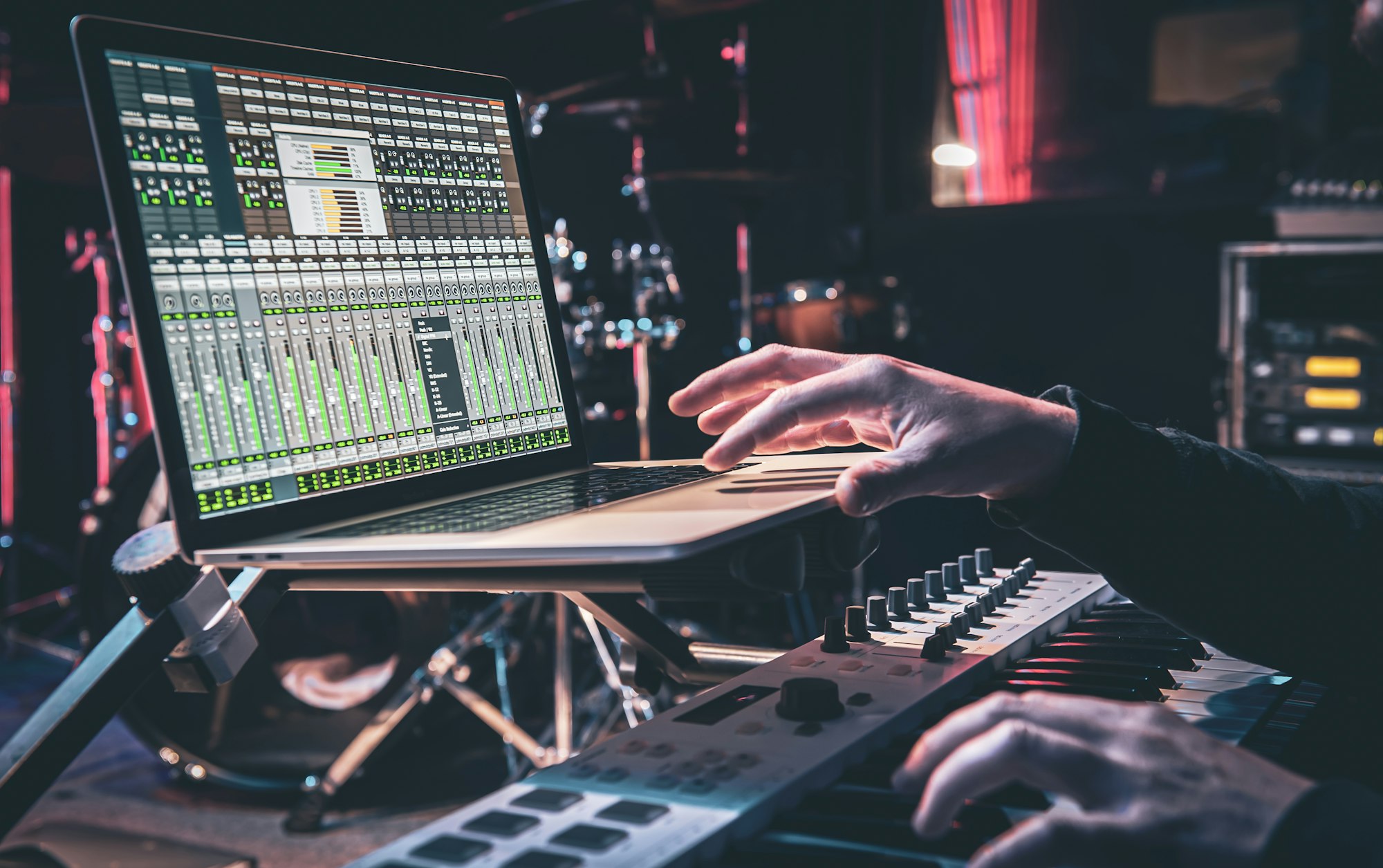 A man composer, producer, arranger, songwriter, musician hands arranging music.